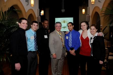 Roger Marino with Torch Scholars